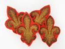 QUATRE FLEURS DE LYS POUR ORNEMENT DE RETROUSSIS D'UNIFORME, Restauration. 26210