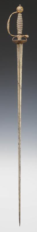 Photo 2 : COURT SWORD IN POLISHED STEEL WITH HUNTING DECOR AND GOLD BACKGROUND, Former Monarchy, reign of Louis XV, circa 1745-1755. Item No. 28808.