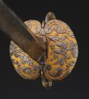 Photo 8 : COURT SWORD IN POLISHED STEEL WITH HUNTING DECOR AND GOLD BACKGROUND, Former Monarchy, reign of Louis XV, circa 1745-1755. Item No. 28808.