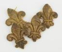FOUR FLEUR-DE-LIS FOR THE ORNAMENTATION OF UNIFORM TURNBACKS, Restoration period. 26212