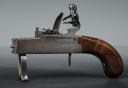 Photo 3 : Iron–mounted flintlock tinderlighter, 19th century.