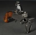 Photo 4 : Iron–mounted flintlock tinderlighter, 19th century.