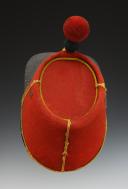 Photo 7 : SHAKO OF THE 90th INFANTRY REGIMENT, 1st BATTALION, model 1868, Second Empire. Inventory number 31235R.