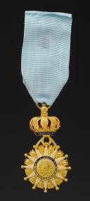 Photo 2 : REPRODUCTION D'UNE ÉTOILE DE CHEVALIER DE L'ORDRE DE LA RÉUNION, modèle Premier Empire, fabrication XXIème siècle. 33723