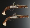PAIR OF OFFICER'S PISTOLS WITH SILVER TRIM, SIGNED "BELLAN À TOULOUSE", Former Monarchy. 30131