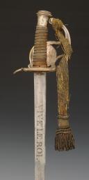 Photo 11 : SABRE DE RÉCOMPENSE ET PLAQUE DE CEINTURON, DIT « DES PAROISSES », donnés à François-Pierre DAUGUET, Capitaine au corps de Basse Normandie de l'Armée Royale de l'Ouest, modèle 1816, Restauration. 29991