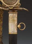 Photo 3 : SABRE DE RÉCOMPENSE ET PLAQUE DE CEINTURON, DIT « DES PAROISSES », donnés à François-Pierre DAUGUET, Capitaine au corps de Basse Normandie de l'Armée Royale de l'Ouest, modèle 1816, Restauration. 29991