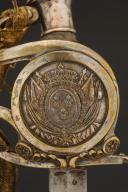 Photo 9 : SABRE DE RÉCOMPENSE ET PLAQUE DE CEINTURON, DIT « DES PAROISSES », donnés à François-Pierre DAUGUET, Capitaine au corps de Basse Normandie de l'Armée Royale de l'Ouest, modèle 1816, Restauration. 29991