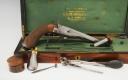 Photo 2 : PISTOLET GASTINNE RENETTE À BLOC TOMBANT, PRÉSENTÉ DANS SON COFFRET D'ORIGINE, Second Empire. 33598
