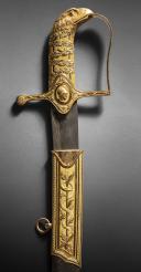 Photo 5 : Gold sabre by the Austrian cutler Kolbe with the cipher of Emperor Napoleon, First Empire, circa 1810. PHILIPPE MISSILLIER COLLECTION, Giquello auction house, Drouot - rooms 5-6, March 6 & 7, 2025.