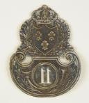Photo 2 : Shako plate of an officer of the 11th Light Infantry Battalion, model 1821. Restoration.