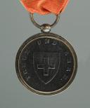 Photo 1 : DÉCORATIONS SUISSES, Médaille d'honneur du 10 août 1792, en fer fondu bronze, Restauration, premier quart du XIXe siècle.