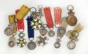 LOT OF TWELVE REDUCED-SIZE DECORATIONS FROM THE RESTORATION TO THE THIRD REPUBLIC. 30323