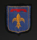 ÉCUSSON DE COMMISSARIAT DE PROVENCE DES CHANTIERS DE JEUNESSE, exemplaire tissé pour cadre; Seconde Guerre Mondiale. 31712-3
