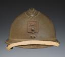 ADRIAN HELMET FOR PASSIVE DEFENSE WITH INTERIOR LINER MADE FROM A GERMAN HELMET LINER, model 1926, World War II. 29643R