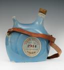 SARREGUEMINES EARTHENWARE - BOTTLE OF COGNAC IN THE SHAPE OF A POILU WATER CAN, MODEL 1877, Third Republic. 27445R