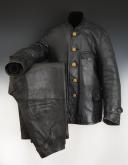 JACKET AND TROUSERS MADE OF PROTECTIVE LEATHER FROM THE GERMAN NAVY, Kriegsmarine black leather suit for engine personnel, Second World War. 33036R