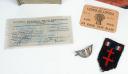 Photo 2 : 468	Deux carnets de tickets de rationnement, insigne FFI, ticket de pain,...