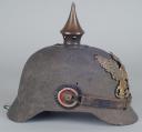 Photo 8 : 263	CASQUE A POINTE TROUPE ERSATZ AVEC SON COUVRE-CASQUE DU 9. Badisches Infanterie-REGIMENT Nr.170, modèle 1914-1915. 