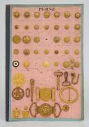 Button plates, insignia, and belt buckles from the Imperial State of Persia, 1925-1979. 21567-2