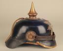 Photo 3 : 160	CASQUE À POINTE TROUPE D'INFANTERIE DE RÉSERVE SAXON «KÖNIGLICHE SACHSISCHE GRENADIER RESERVE REGIMENT Nr133», modèle 1895.