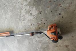 Location outil Taille haie sur perche Thermique Stihl près de Le Pavillon-Sainte-Julie