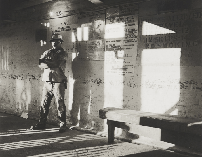 ƒ David Goldblatt (1930-2018, South Africa) A miner waits on the bank to go underground, City Deep Gold Mine, 1966 (2_3041) (printed later) Platinum print on Arches Platine 310gm paper Signed, dated and inscribed 1/4 in pencil along the bottom margin Number 7, from an edition of 10 37 x 37 cm (image) 75.5 x 56.5 cm (sheet) Provenace : Goodman Gallery, Johannesburg.