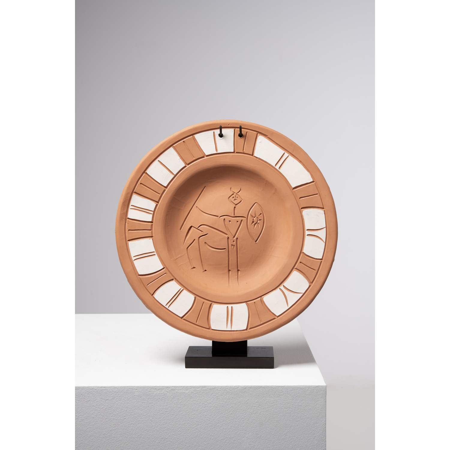 Pablo Picasso (1881-1973) Centaure (A.R. 102), 1950 Engraved terracotta dish and white engobe - Embossed stamp, 'MADOURA PLEIN FEU' and 'EDITION PICASSO' Engraved 'EDITION PICASSO 27/250 - N&deg; 108' &Oslash; 39 cm &copy; Picasso succession 2021