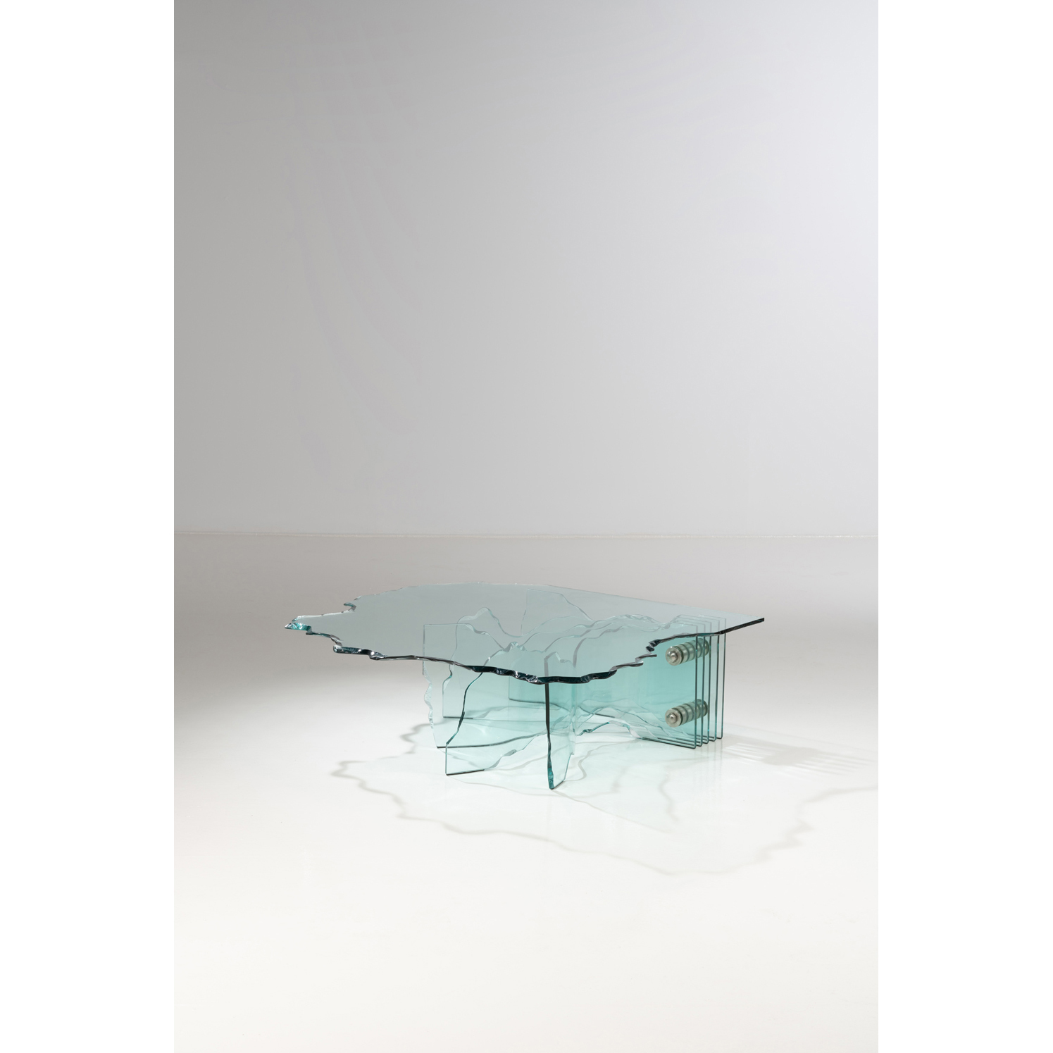 Danny Lane (born 1955) Shell Estimation : 2500 / 3500 &euro; Danny Lane (born 1955)  Shell  Coffee table  Glass and steel  Fiam Edition  Manufacturer&rsquo;s mark on one foot  Creation date: 1989  H40&times;L119&times;P122cm