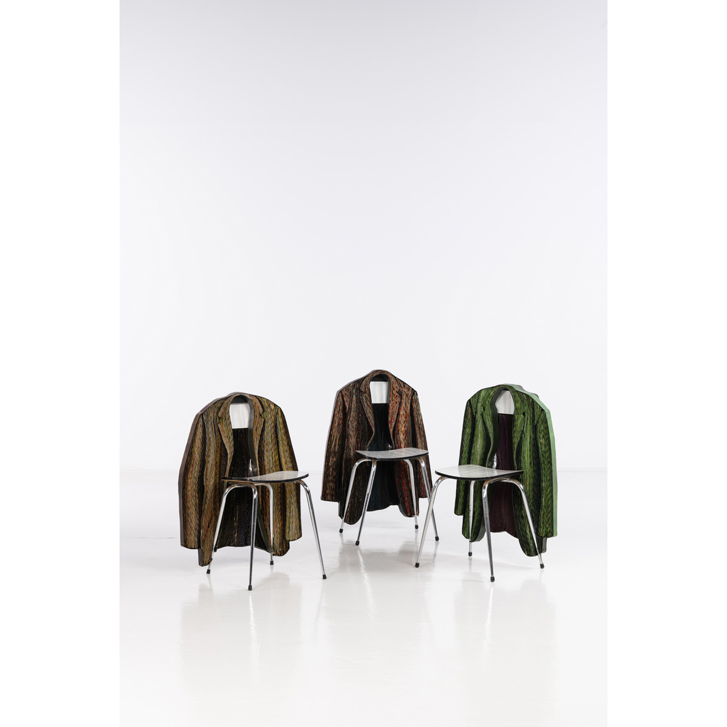 Pavlos (Pavlos Dionyssopoulos) (1930-2019) Le congrès, 1967 Trimmed papers and pieces of fabric on Formica chairs Signed and dated on the seating (on one chair) 82 x 60 x 43 cm (brown) 89 x 63 x 43 cm (red) 84 x 55,5 x 40 cm (green) Provenance: Artist's family Exhibition: Hanover, Kunstverein Hannover, March 11 - April 16 1972, black and white illustration of a similar model in the catalogue under n°68, p. 83 Bibliography: - M. Benayoun, "Pavlos", Linda & Guy Pieters ed., 2008, black and white illustration of a similar model in the catalogue, p. 237 - K. Koskina, "Pavlos Dionyssopoulos", The J.F. Costopoulos Foundation, Adam Editions, 1997, illustrated p. 248 Note: These works were originally part of an environment at the Thomas Gallery in Munich in 1968 The buyer will be provided with an authenticity certificate from the artist's estate  See more ESTIMATE: 30000 / 50000 €