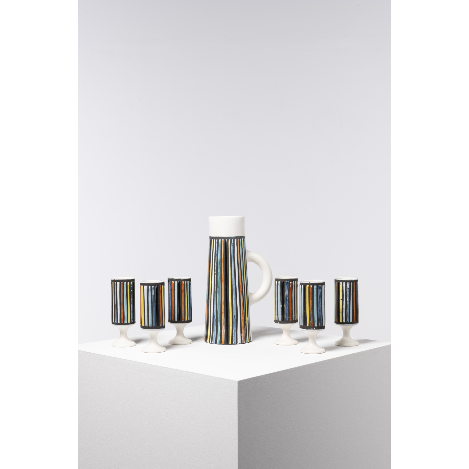 Roger Capron (1922-2006) Drinking set with pitcher and six glasses Glazed ceramic Pitcher signed 'CAPRON VALLAURIS BA', each glass inscribed with 'BA' on the reverse Models created circa 1955 Pitcher: H 33 &times; &Oslash; 12 cm Glasses: H 17 &times; &Oslash; 6 cm