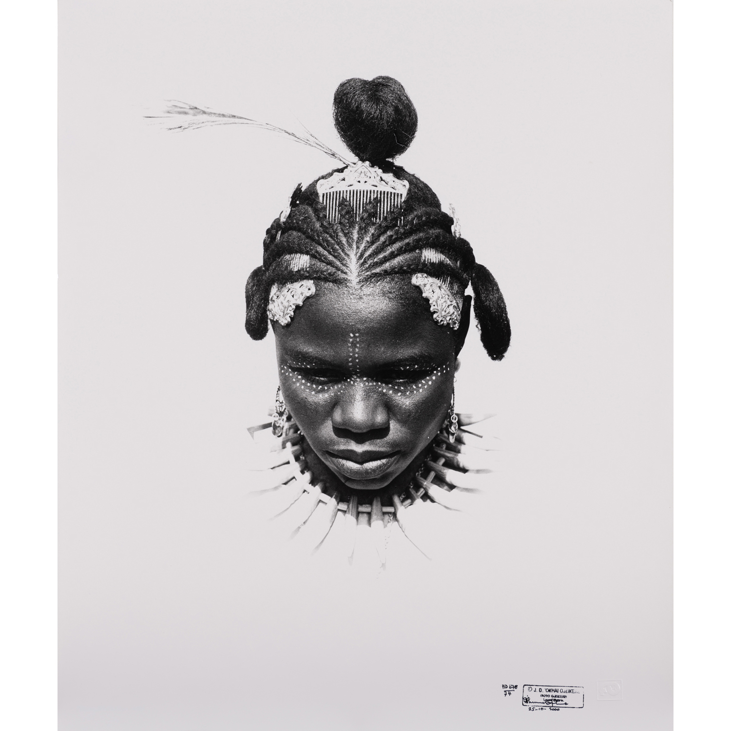 J.D. 'Okhai Ojeikere (1930-2014) Etine Uton Eku, 1974-2000 Silver print, printed in 2000 Signed, dated and annotated in black ink with the photographer’s dry stamp "678/74" on the bottom right, and annotated on the reverse 'HD 678/74' 60,5 x 51 cm Provenance: A.M. collection, Paris