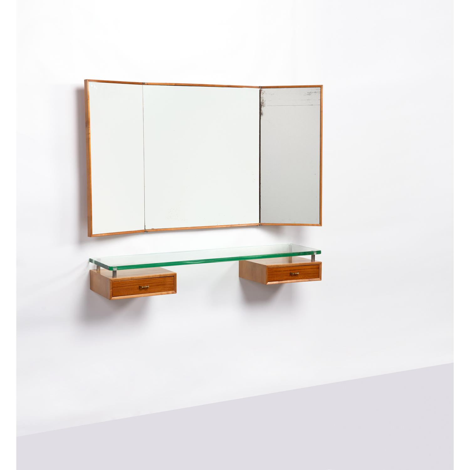 Gio Ponti (1891-1979) Coiffeuse murale Bois de poirier, laiton, métal, verre et miroir Modèle créé vers 1957 H 76,5×L 137×P 3 cm (miroir) H 16,5×L 122×P30 cm (tablette murale)