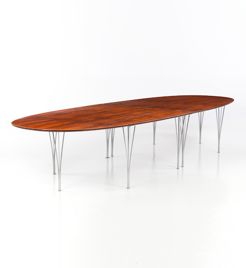 Piet Hein (1905-1996) & Bruno Mathsson (1907-1988) Super-ellipse Table Palissandre et m&eacute;tal Edition Bruno Mathsson International Marqu&eacute;e 'Piet Hein Bruno Mathsson' sous la table Date de cr&eacute;ation : 1968 H 70&times;L 421&times;P 140,5cm Bibliographie : D. Widman, K. Winter & N. Stritzler-Levine, 'Bruno Mathsson : Architect and Designer', Ed. Bokforlaget Arena, Malmo and the Bard Graduate Center, New York, 2006, mod&egrave;le similaire reproduit pp. 70-71, 79 et 84 12 000/18 000&euro;