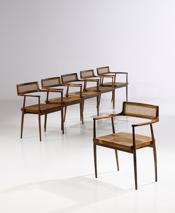 74. &fnof; Joaquim Tenreiro (1906-1992) Suite de six fauteuils Bois d'imbuia et cannage Date de cr&eacute;ation : ann&eacute;es 1960 H 77&times;L 63,5&times;P 47cm Bibliographie: - A. Vincente & M. Vasconcellos, 'Movel Moderno Brasileiro / Brazilian Modern Design', Ed. Olhares 2017, p. 65 - 'Brazilian Furniture Design', Ed. Olhares, 2013, p. 45 18 000/25 000&euro;