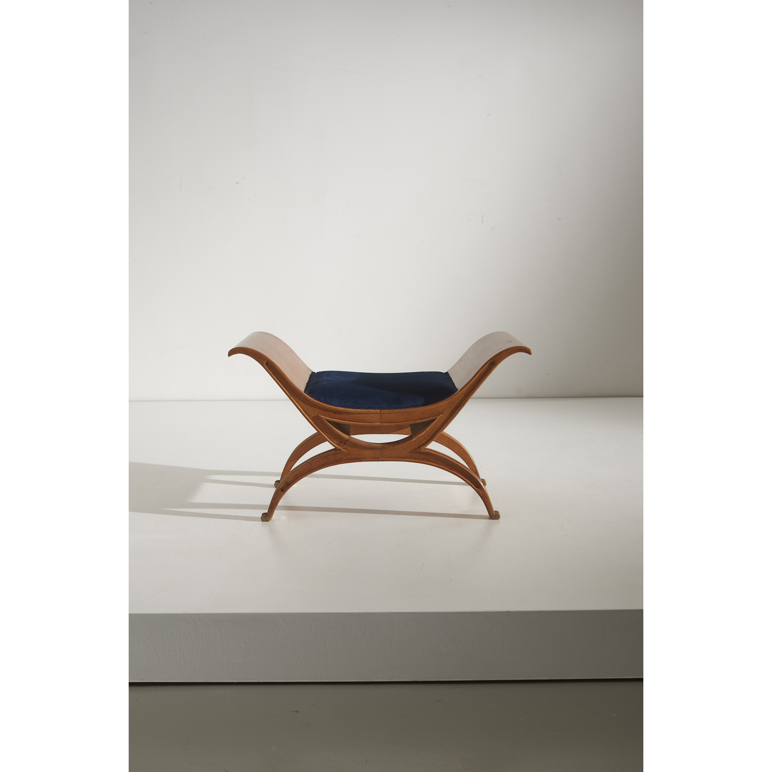 Ernesto Basile (20th c.) Stool Maple, brass and fabric Edited by Ducrot Model created circa 1953 H 44,5&times;L 74&times;P 37,5 cm Provenance: Villa O.S., Palerme