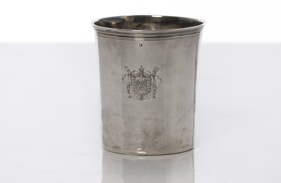 A french silver beaker, engraved on one side of the imperial Coat of arms and on the other side, the Coat of arms of Jean-Baptiste Lecat de Bazancourt. Mark of Louis Jacques Berger, Paris, 1809 - 1819. High : 3,1 in Weight : 90 g. (3,1 oz)   Estimation : 2000 / 3000 euros
