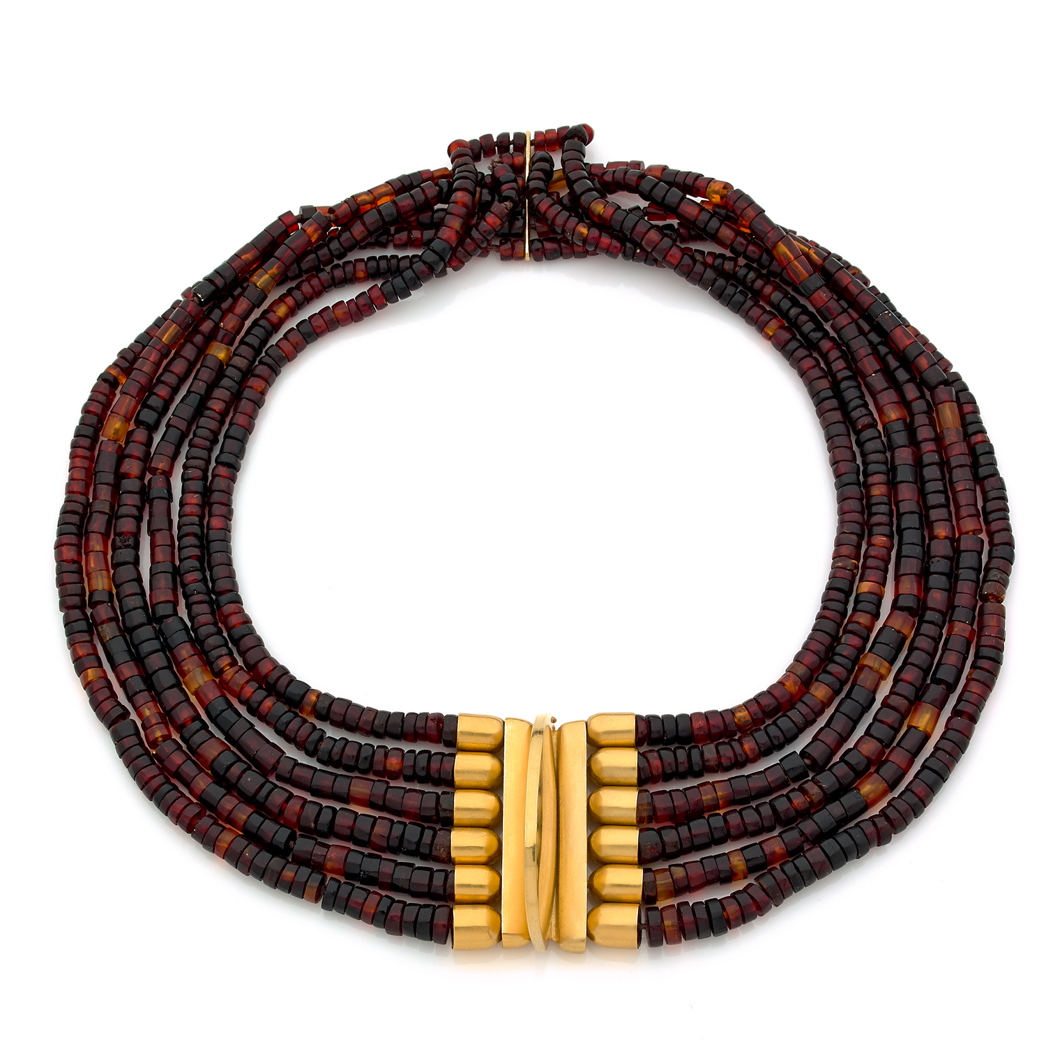 Claude WESEL (1942-2014). "Sculpture" necklace in yellow satined gold 18k (750&permil;) and six lines of amber balls from chiapas - Mexico 2000 Unique piece. Signed Internal diameter : 10,5 cm Dimensions : 4 x 3 x 2,4 cm Poids brut : 80,1 g CONDITION REPORT : Very good overall condition No sign of use.