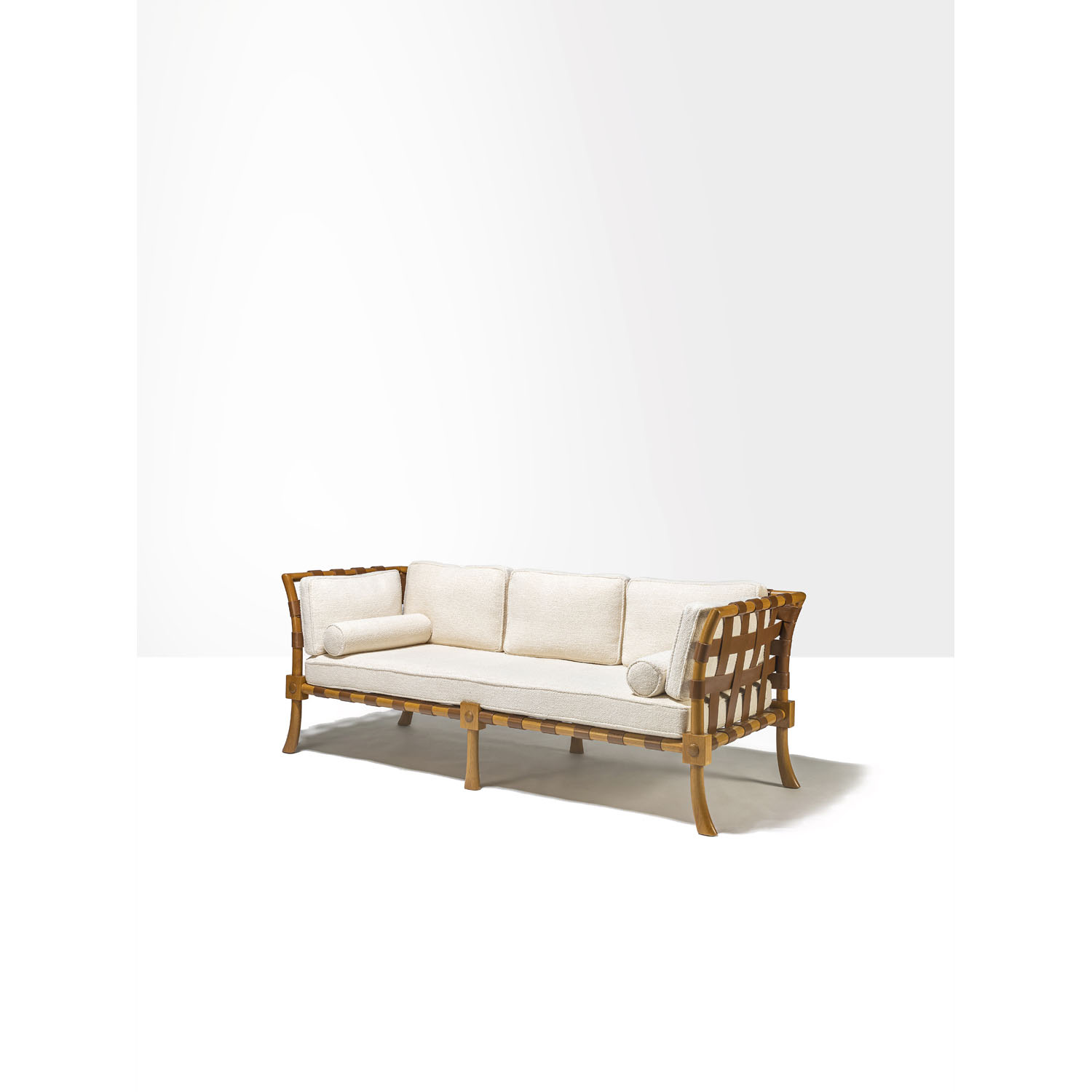 Terence Harold Robsjohn-Gibbings (1905-1976) Sofa - Unique piece Estimation : 15000 / 20000 € Terence Harold Robsjohn-Gibbings (1905-1976) Sofa - Unique piece Whitened walnut, leather and fabric Peterson Studios edition Creation date: 1937 H 81×L 213×P 81 cm