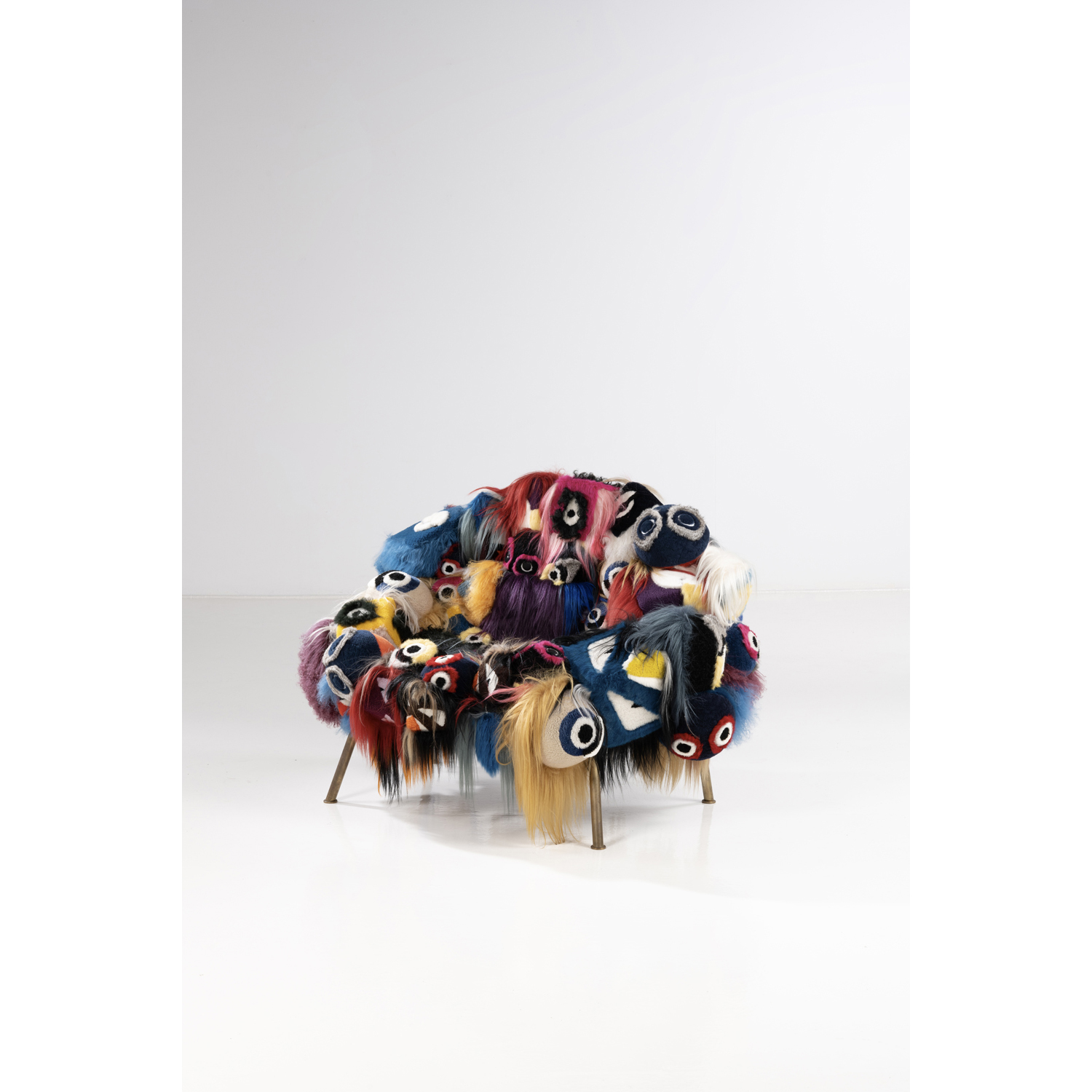 Humberto Campana (born 1953) & Fernando Campana (born 1961) The armchair of Thousand Eyes - Unique piece Armchair Brass and fabric Edited by Fendi Model created in 2015 H 87 &times; L 130 &times; P 72 cm