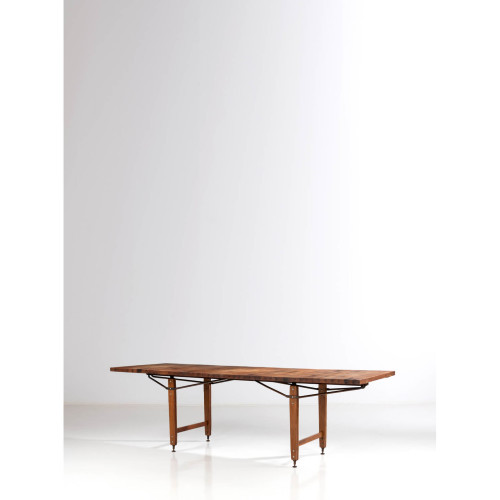 Franco Albini (1905-1977) & Giuseppe Davanzo (XX) Estimation : 7000 / 9000 € Franco Albini (1905-1977)  & Giuseppe Davanzo (XX)  Dining table - Special order  Wood, metal and brass  Creation date: circa 1950  H 79,5 × L 259 × P 89 cm  Provenance: Special order for a private residence in Treviso, Italy