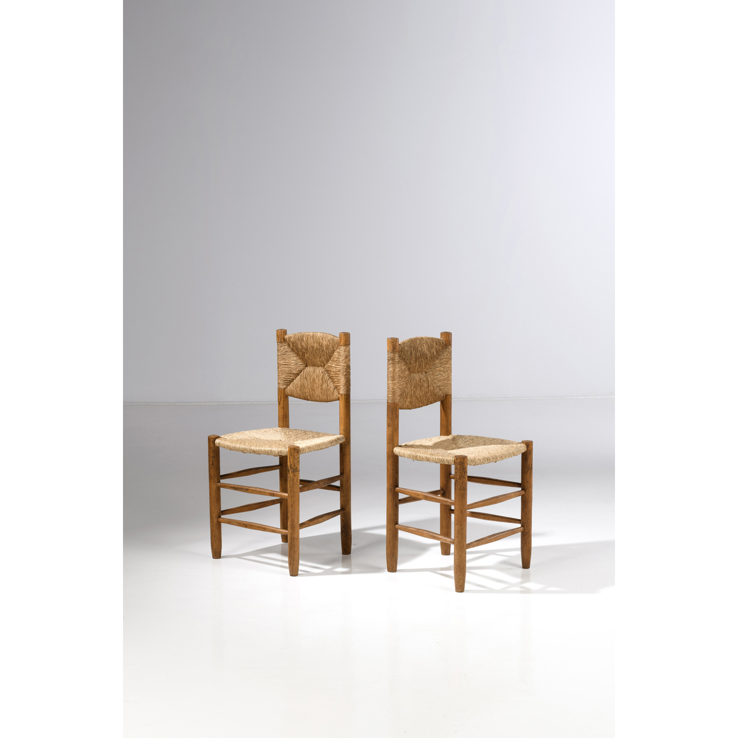Charlotte Perriand (1903-1999) Pair of chairs model n°19, 
