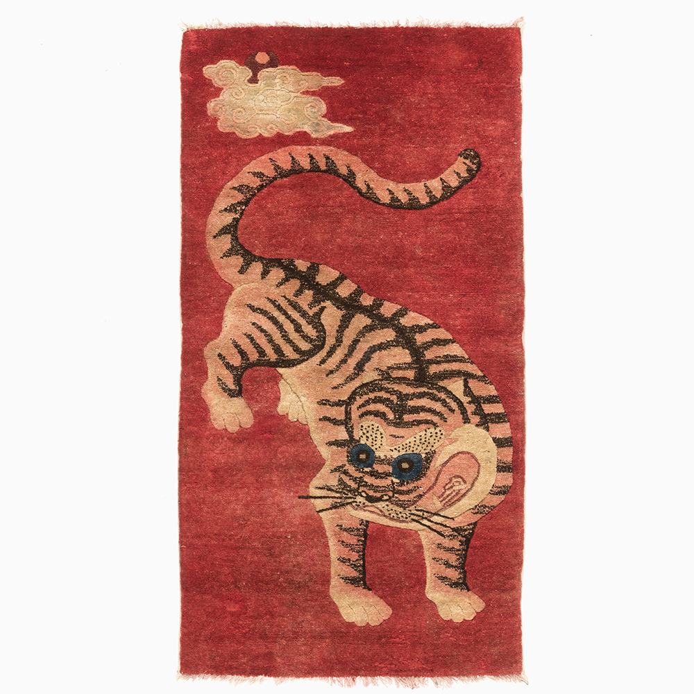 Tapis fait main en laine tigre : tapis tendance inspiré