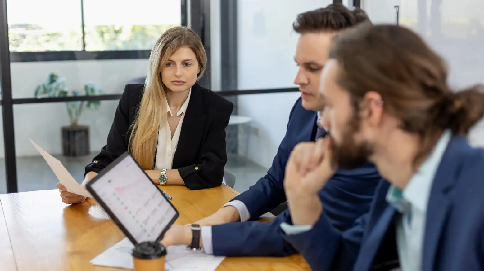 Logistics and finance experts analyzing data