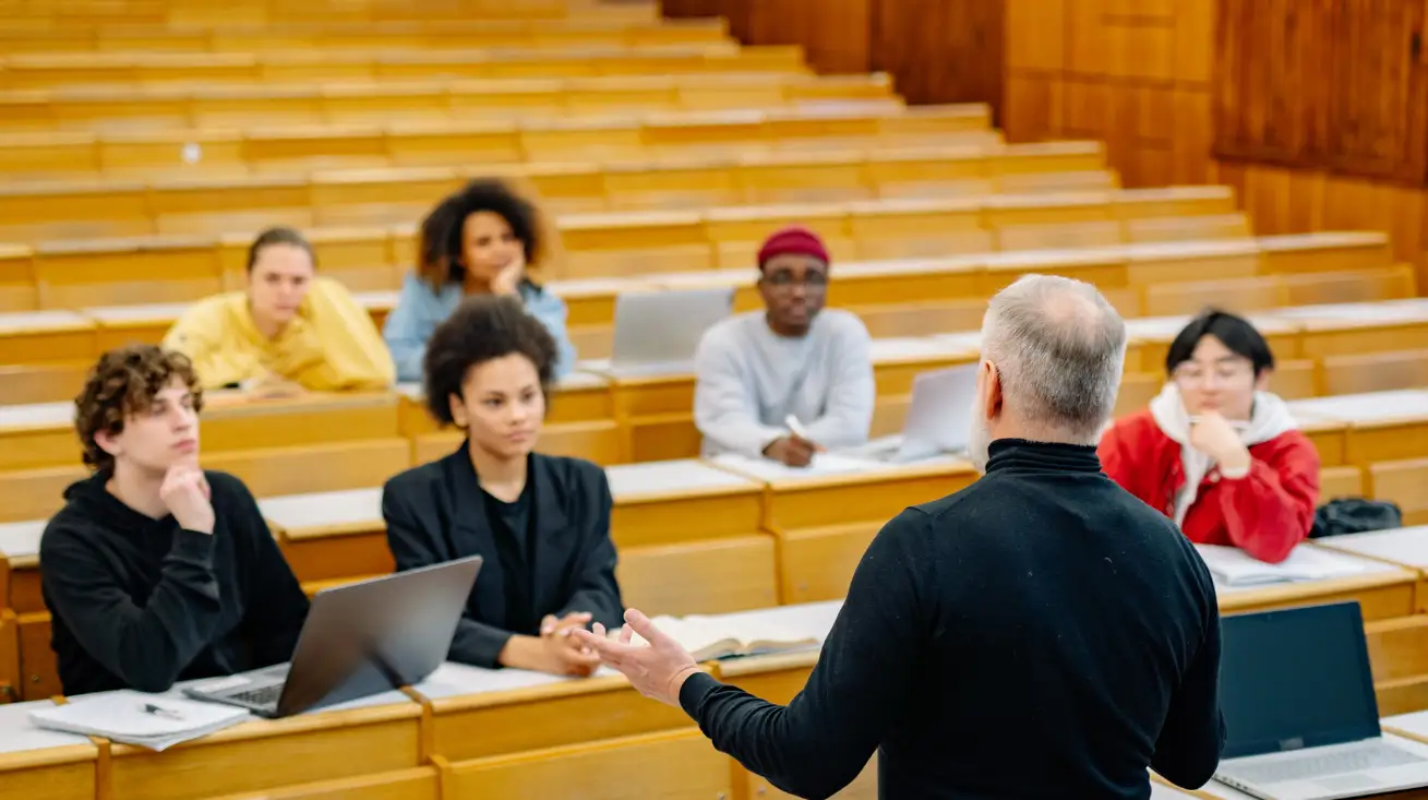 A university professor is talking to medical students