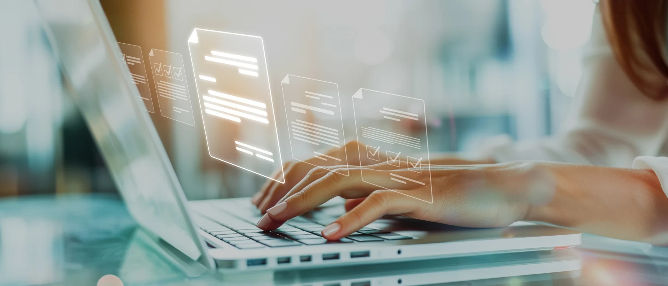 An employee is migrating digital forms on a laptop
