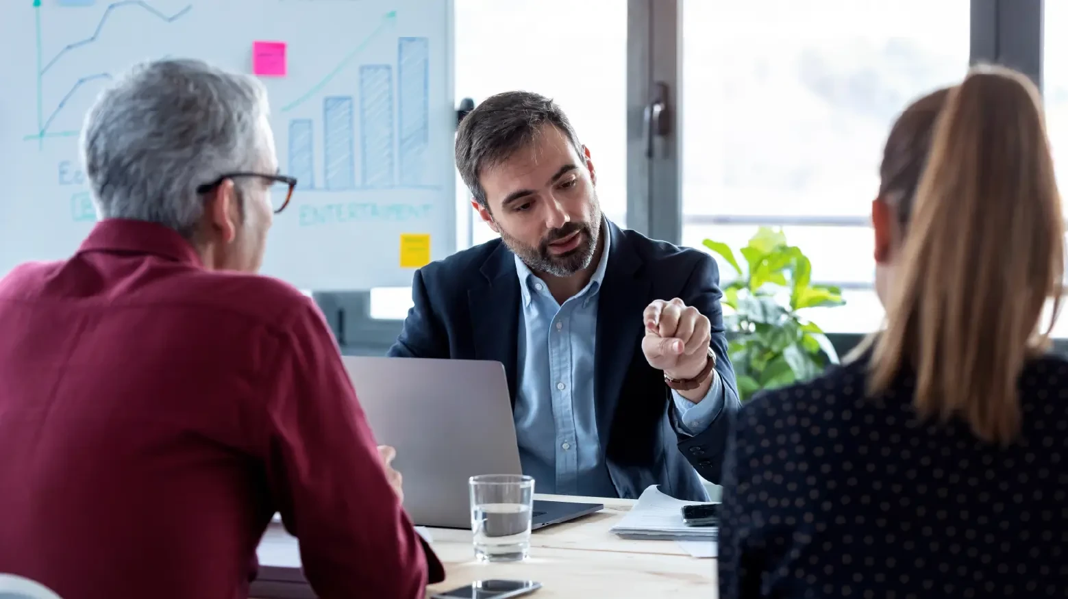 Multicultural people working with Oracle technology and managed solutions