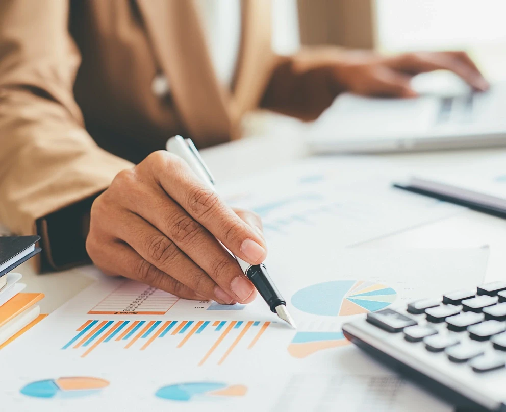 A businessman calculating the company budget