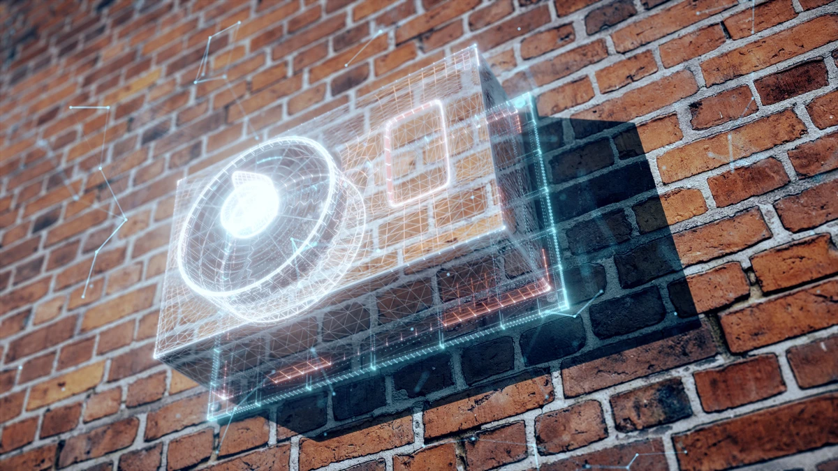 A digital heat pump mounted on a brick wall