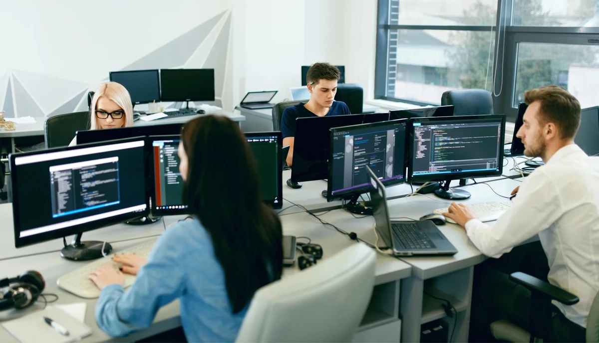 People Working In Modern Office.